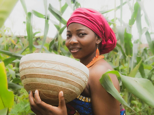 person holding a coconut