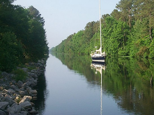 boat traveling down a river 