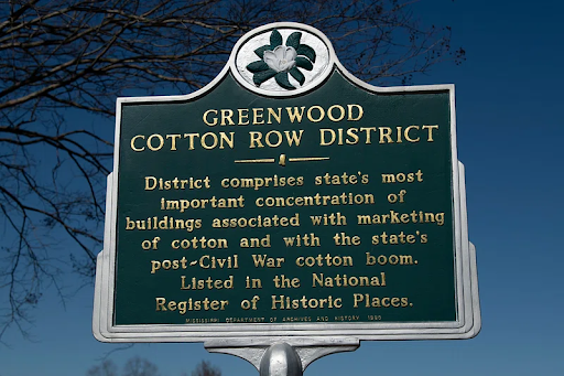 sign that says greenwood cotton row district