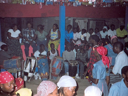 haitian people sitting together