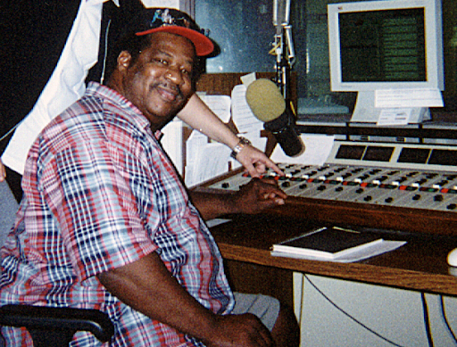 jerry lawson sitting in front of a computer