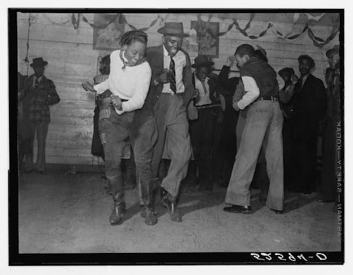 people jitterbugging in juke joint