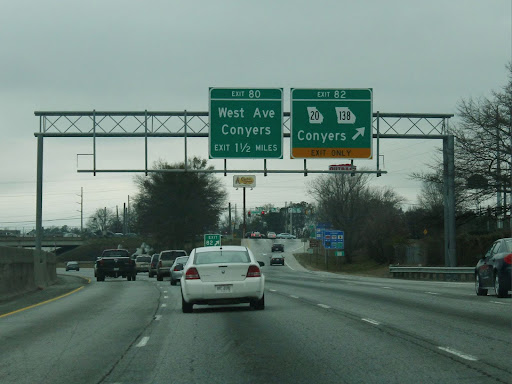 exit road signs over a high way