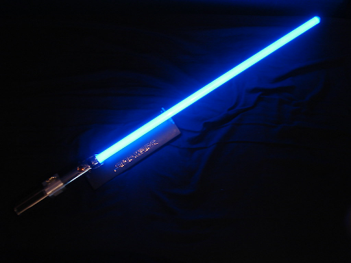 light saber lit up in the dark