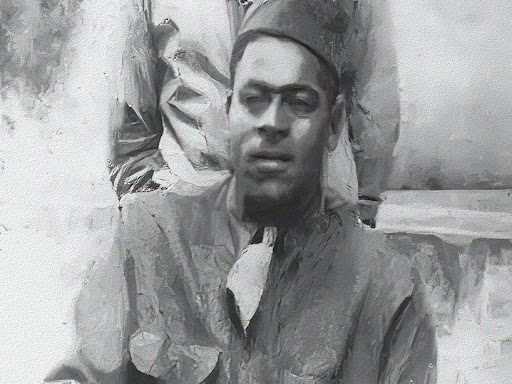 photo of man sitting down