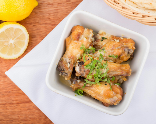 baked chicken in white bowl