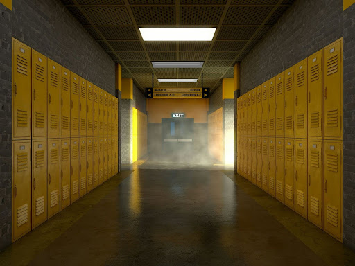 empty hallway in a school with yellow lockers