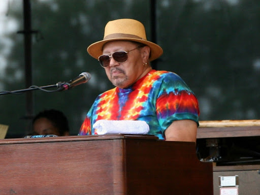 art neville playing at a concert 