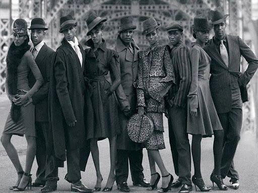 group of young black men and women standing together 