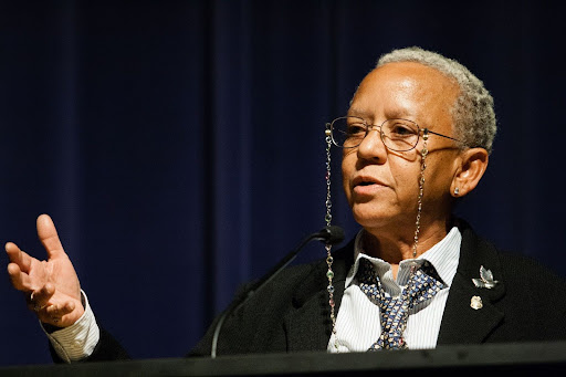 nikki giovanni speaking with hand extended