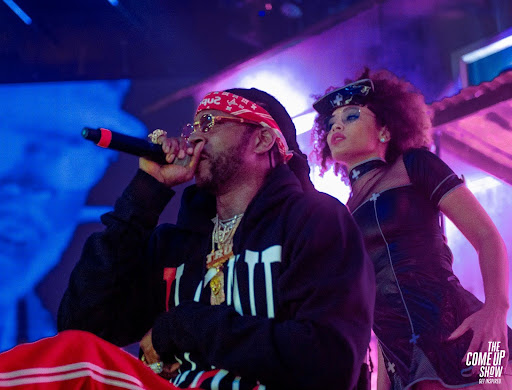 2 chainz rapping into the microphone