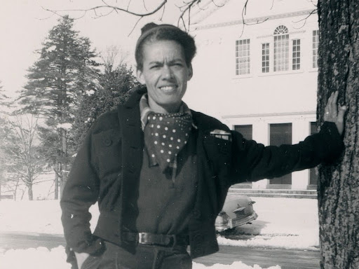pauli murray leaning on a post