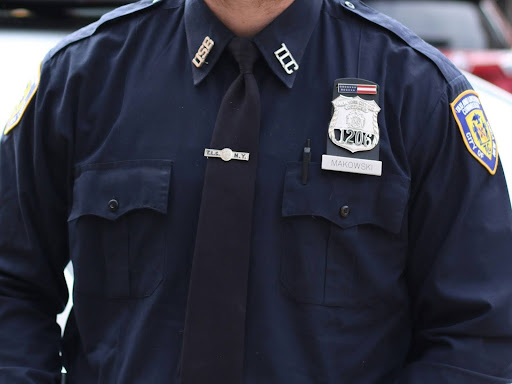 frontal shot of a police man in uniform