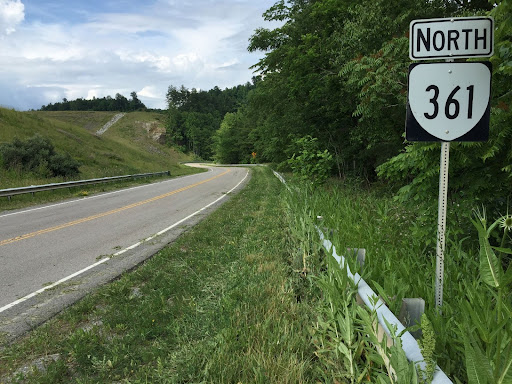 road sign that says north 361