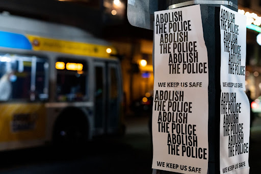 sign that says abolish the police