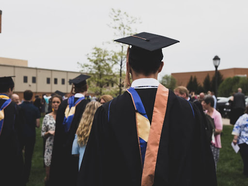students in graduation gowns and caps 
