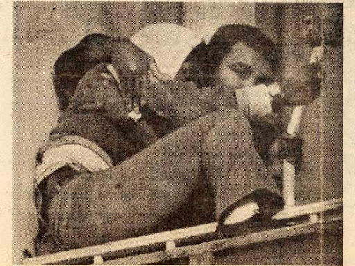 muhammad ali holding back man about to jump from ledge