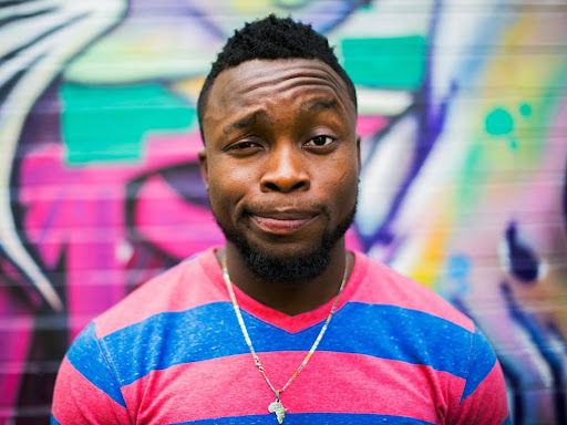 black man raising eyebrows facial expression