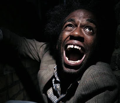 black man screaming