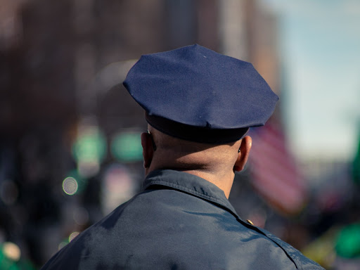 back of police man's head