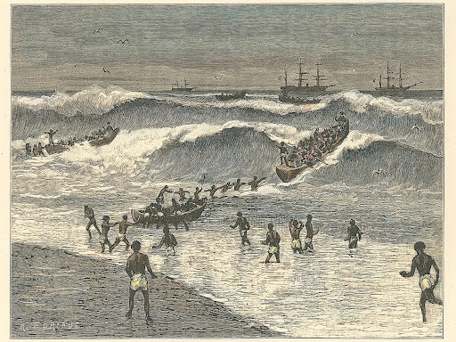african people surfing in a wave