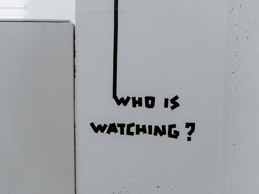 who is watching on a white wall