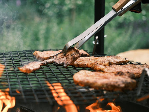 grilled meat on charcoal grill