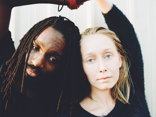 black and white woman close together