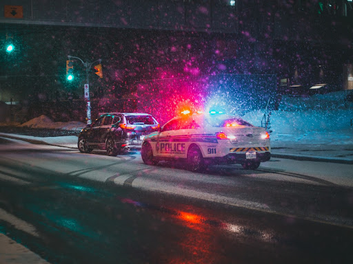 police car pulling over a vehicle