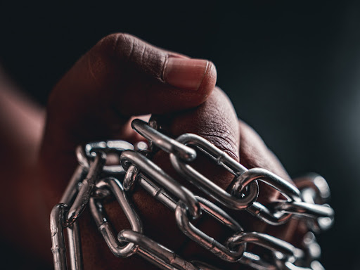 hand holding chains