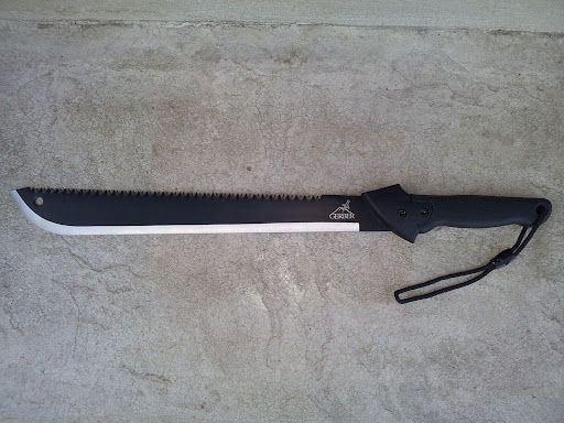 machete laying on the concrete