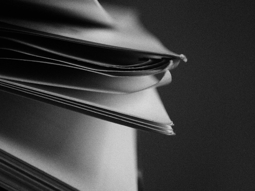 corner of a pile of papers