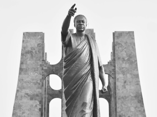 black and white photo of a statue of buddha 