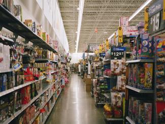 aisles in a grocery store filled with product