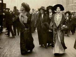 adella hunt logan and other women marching together 