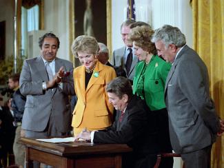 Ronald Reagan signing bill