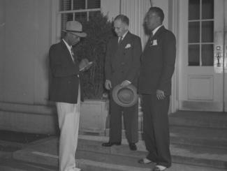 group of men getting together and chatting