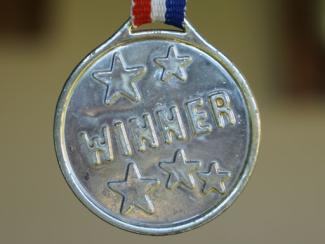 medal that says winner