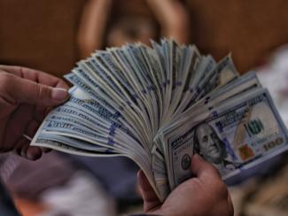 Handful of US $100 bills