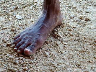 Bare foot on ground