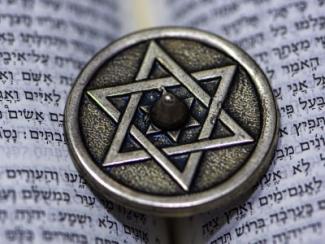 silver Star of David on a Torah