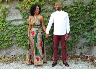 black woman and man holding hands