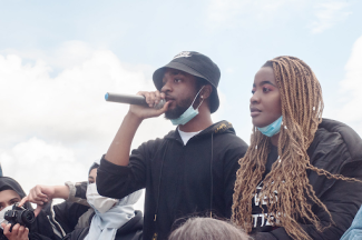 Activists speaking to crowd