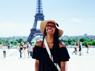 Happy Black traveler in Paris France