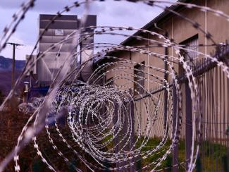 barbed wire outside of a prison