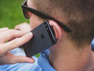 Man holding cell phone to his ear