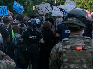 georgia national guard and atlanta police among a crowd of black lives matter protestors