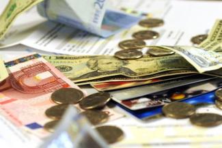 Coins, Dollar Bills and Credit Cards