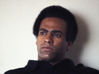 huey newton looking off into the distance 