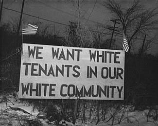 "We want white tenants in our white community" sign